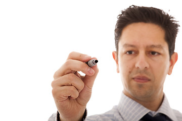 Image showing businessman writing at a whiteboard