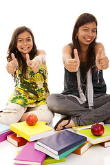 Image showing two young student sisters