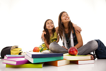 Image showing two young student sisters