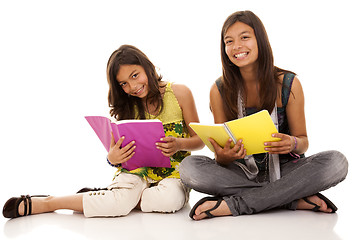 Image showing two young student sisters