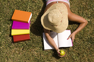 Image showing Studing at the school grass