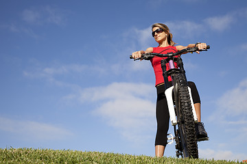 Image showing woman having fun on a bicycle