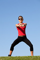 Image showing woman doing exercise outdoor