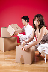 Image showing young couple packing 