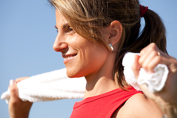 Image showing sport woman with a towel