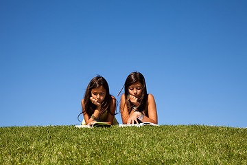 Image showing Reading at the park