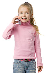 Image showing little girl talks by mobile phone