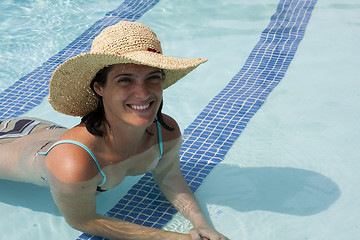 Image showing Relaxing at the pool