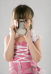 Image showing girl drinks from a cup