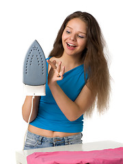 Image showing girl with  iron