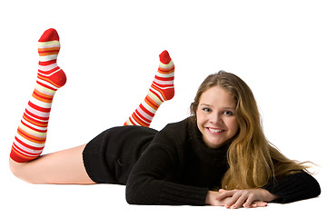 Image showing smiling girl lies on the floor