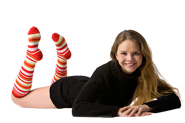 Image showing smiling girl lies on the floor