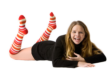 Image showing smiling girl lies on the floor
