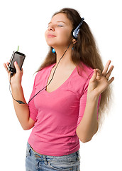 Image showing beautiful girl listens music