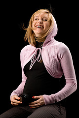 Image showing laughing pregnant girl