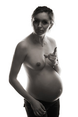 Image showing bared pregnant woman