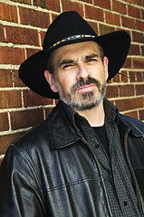 Image showing Bearded man in cowboy hat