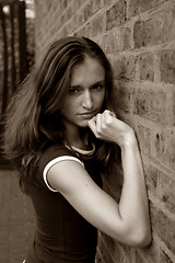 Image showing girl near wall of brick