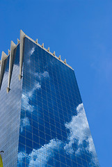 Image showing Office building with reflection of clouds