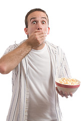 Image showing Man Eating Popcorn