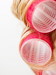 Image showing Red Curlers in Blond Hair