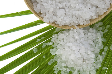 Image showing bath salt and palm leaf