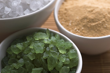 Image showing bath salt and palm leaf