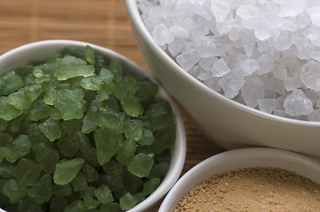 Image showing bath salt and palm leaf