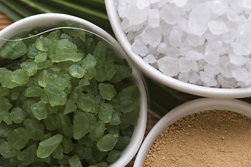 Image showing bath salt and palm leaf