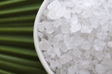 Image showing bath salt and palm leaf