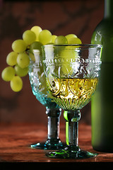 Image showing golden wine in old-time goblet