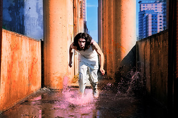 Image showing man runs on the water