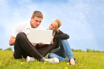 Image showing young people and computer