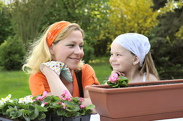Image showing Mother and daughter having gardening time