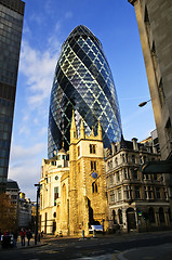 Image showing Gherkin building and church of St. Andrew Undershaft in London