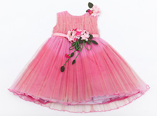 Image showing Baby pink dress with a bouquet on the belt