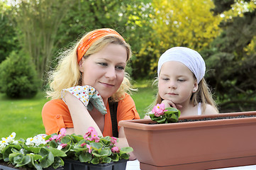 Image showing Mother and daughter having gardening time