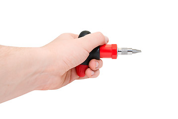 Image showing Hand with  red screwdriver