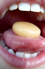 Image showing Child's Mouth with Bonbon