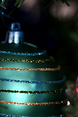 Image showing Christmas ornaments on tree.