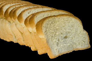 Image showing Slices of bread isolated on black background with clipping path