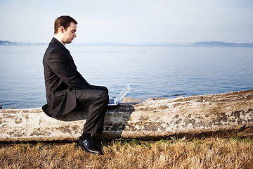 Image showing Caucasian businessman with laptop