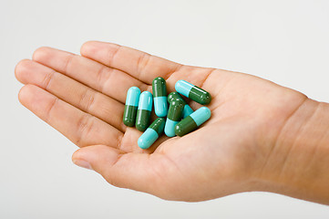 Image showing woman's hand holding antibiotics