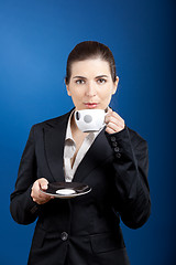 Image showing Drinking a coffee