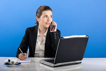 Image showing Businesswoman calling at phone