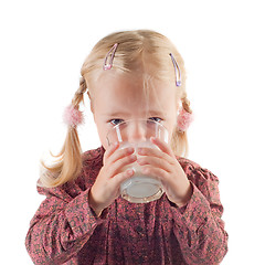 Image showing Little gil drinking milk