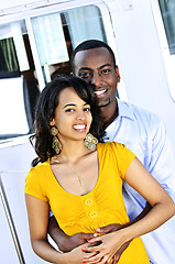 Image showing Happy couple in front of yacht