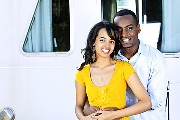 Image showing Happy couple in front of yacht