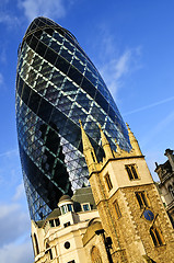 Image showing Gherkin building and church of St. Andrew Undershaft in London