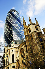 Image showing Gherkin building and church of St. Andrew Undershaft in London